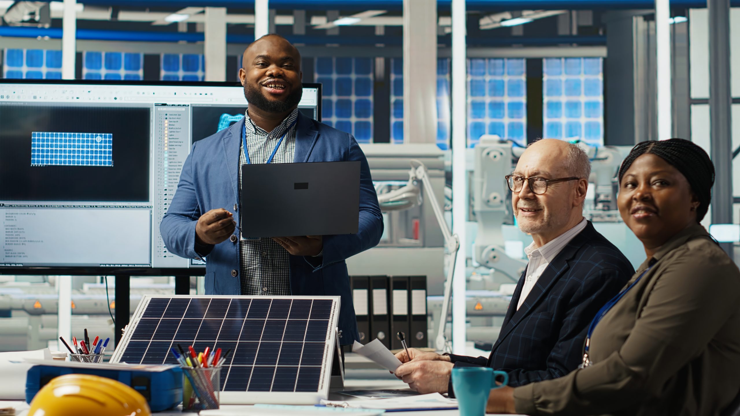 Portrait of smiling photovoltaics factory scientists experimenting with advanced PV materials to improve solar panel durability. Researchers developing efficient sustainable energy solutions, camera B